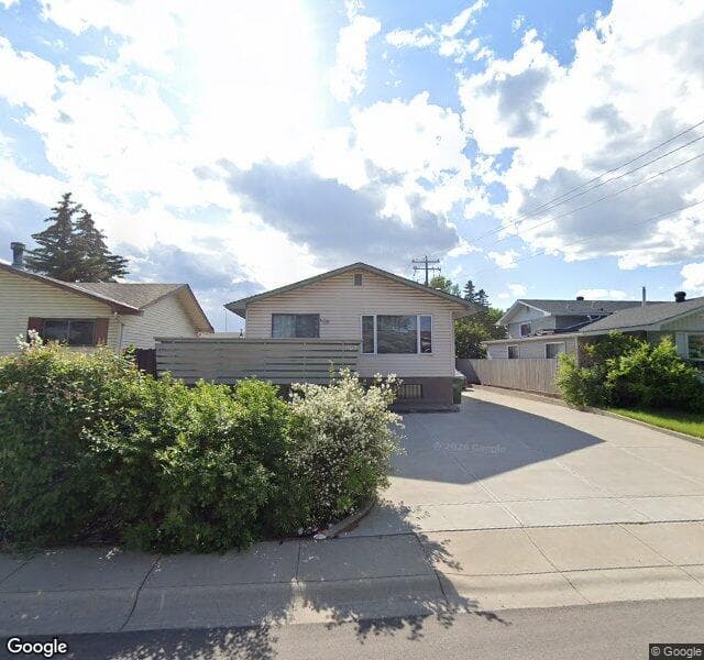 Street view of 107 Rundleridge Place NE, Calgary