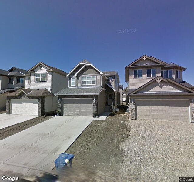Street view of 338 Bridleridge View SW, Calgary