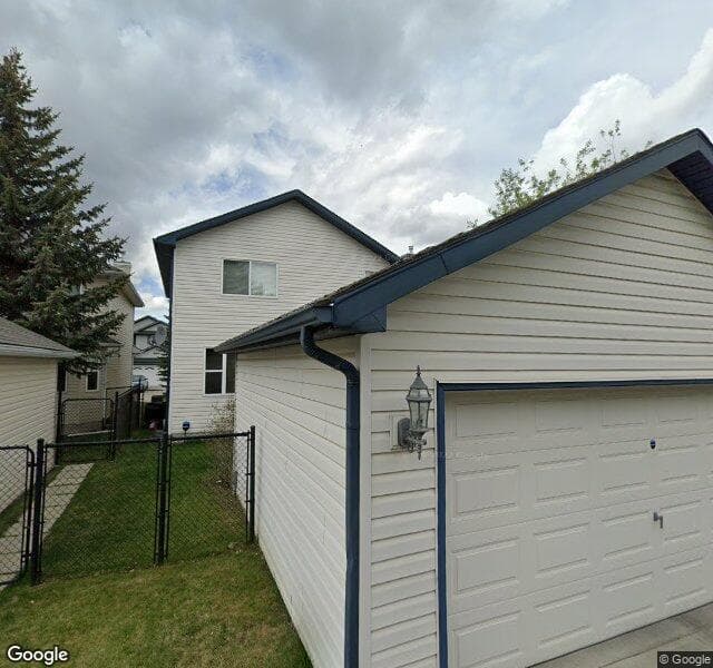 Street view of 150 Rocky Ridge Green NW, Calgary