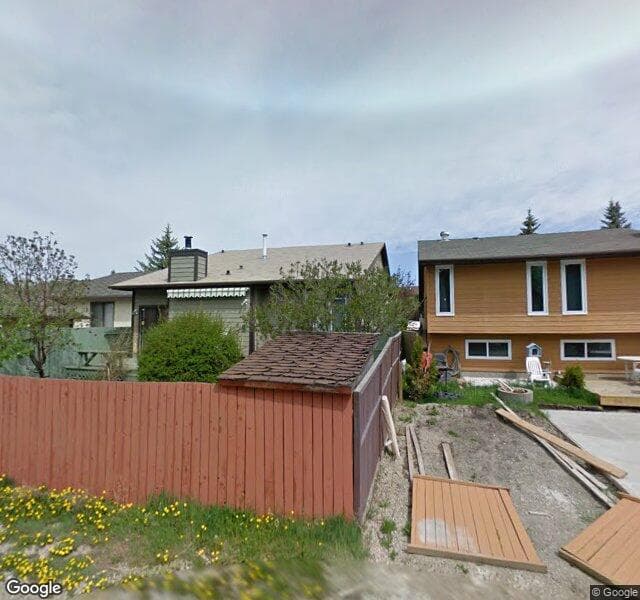 Street view of 15 Woodglen Mews SW, Calgary