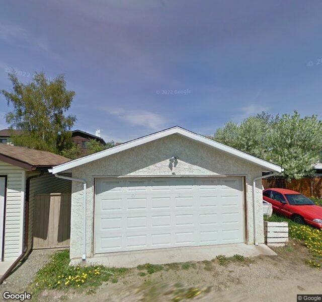 Street view of 232 Pinemeadow Road NE, Calgary