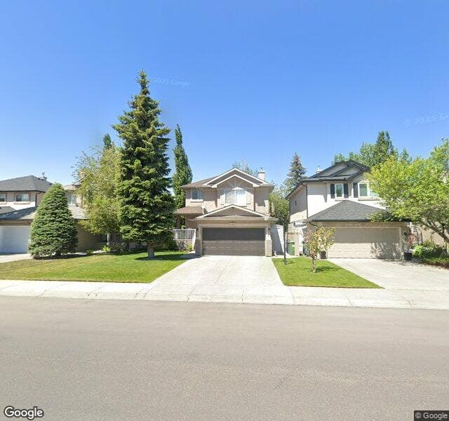 Street view of 1121 Harvest Hills Drive NE, Calgary