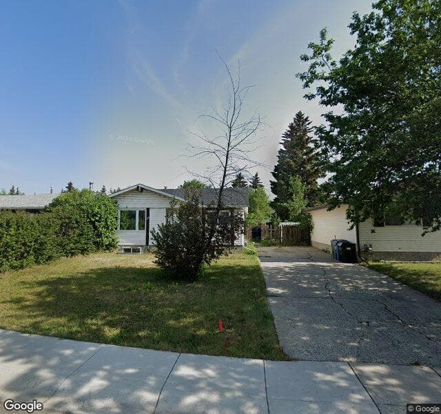 Street view of 223 Pineland Place NE, Calgary