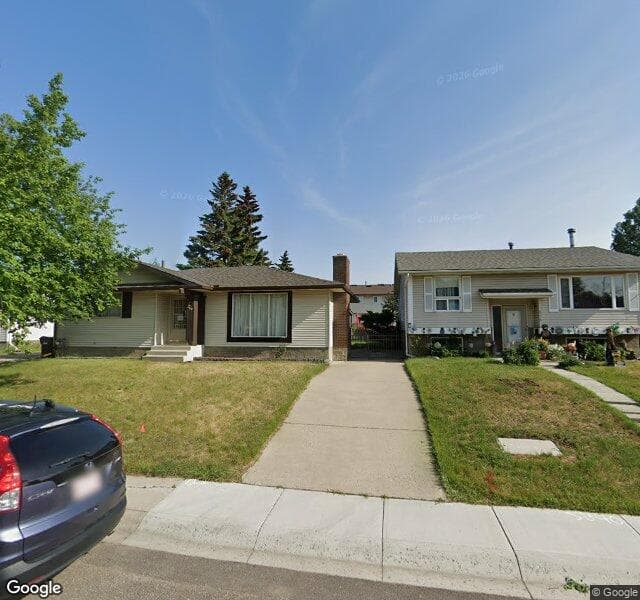 Street view of 219 Pineland Place NE, Calgary
