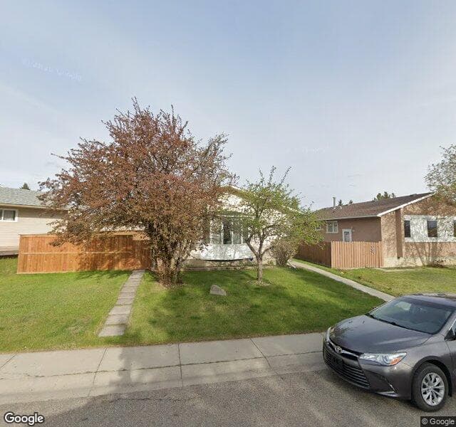 Street view of 111 Pinecliff Way NE, Calgary