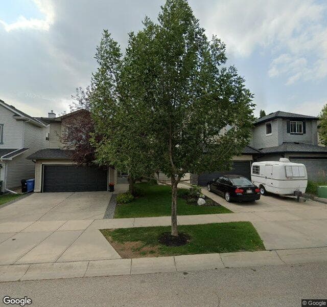 Street view of 221 Tuscany Ravine Road NW, Calgary
