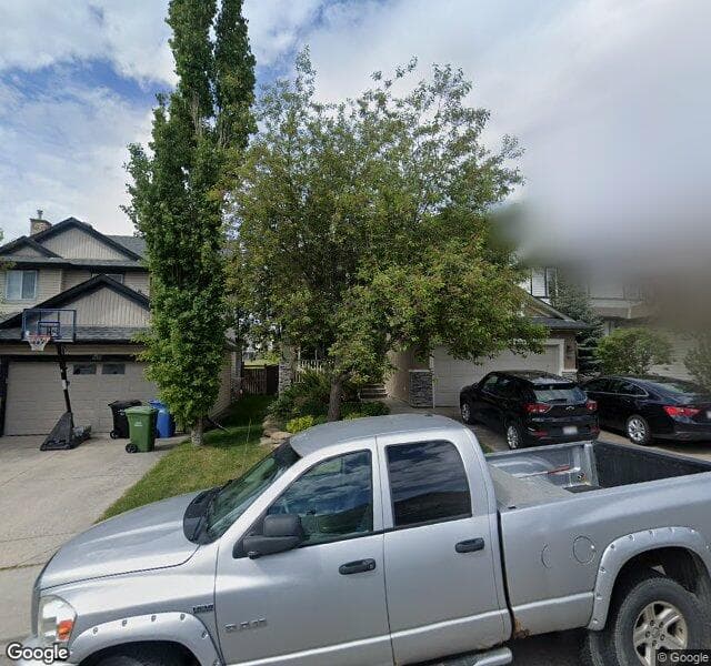 Street view of 216 Hidden Creek Road NW, Calgary