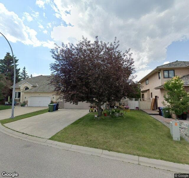 Street view of 212 Diamond Point SE, Calgary