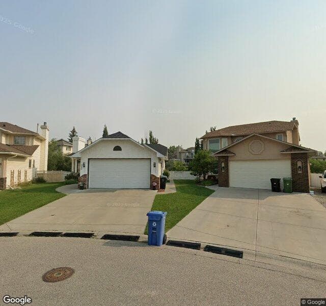 Street view of 220 Scanlon Green NW, Calgary