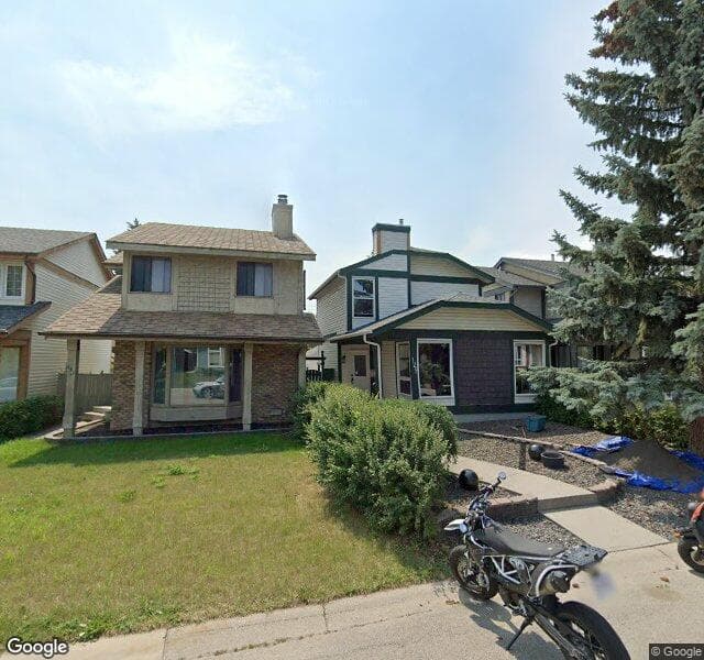 Street view of 129 Woodfield Close SW, Calgary