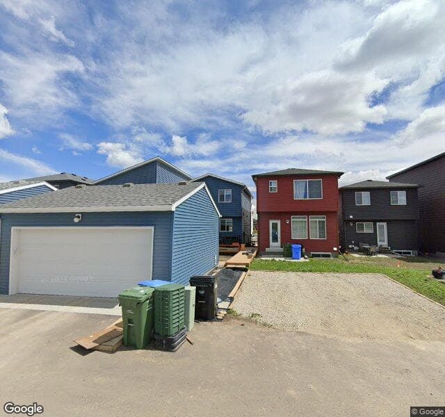 Street view of 318 Belmont Heath SW, Calgary