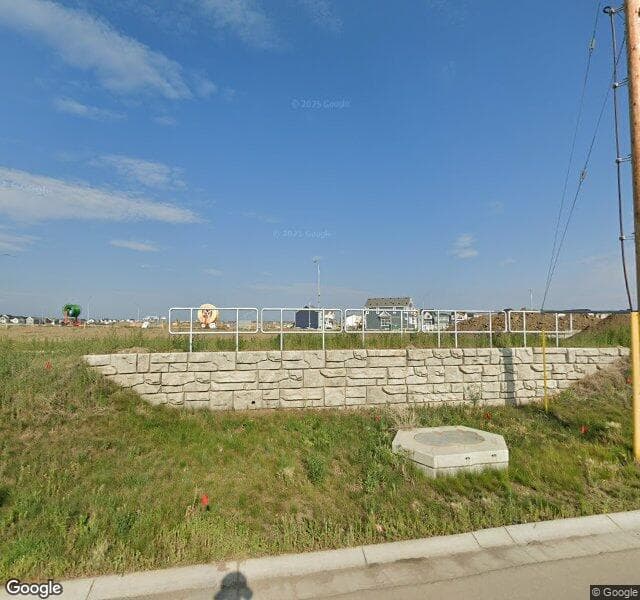 Street view of 36 Magnolia Bay SE, Calgary