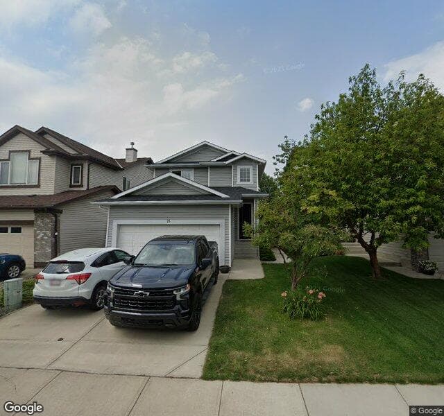 Street view of 18 Tuscany Ravine Close NW, Calgary