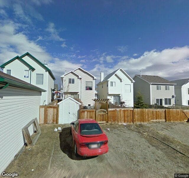Street view of 301 Tuscany Drive NW, Calgary