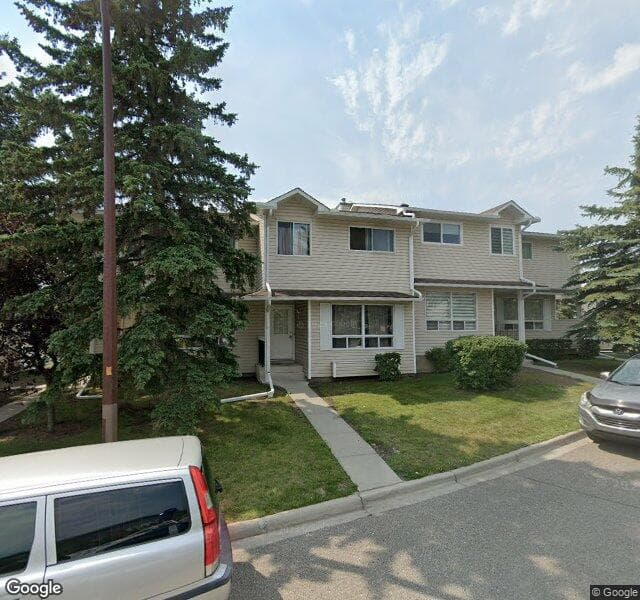 Street view of 125 Woodsman Lane SW, Calgary