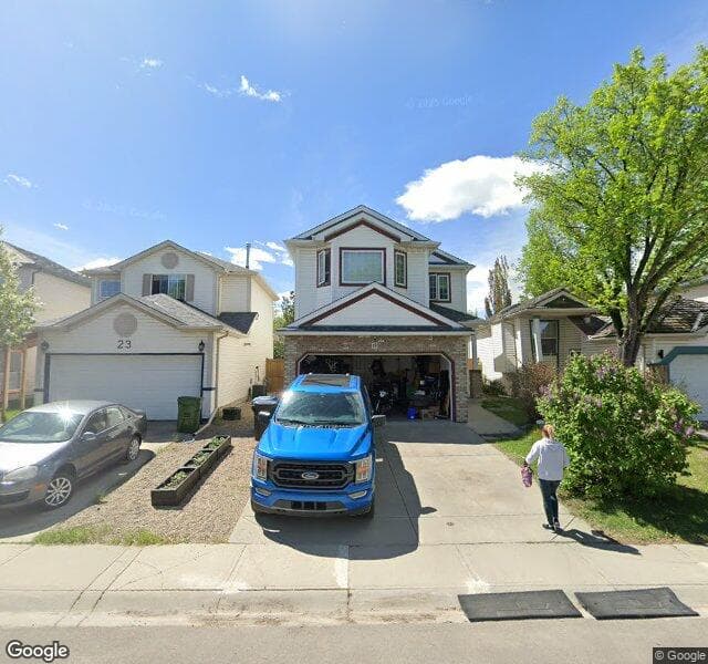 Street view of 19 Mount Apex Crescent SE, Calgary