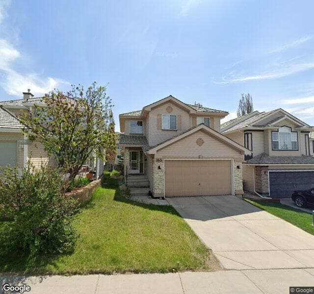 Street view of 165 Spring Crescent SW, Calgary