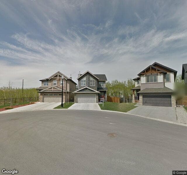 Street view of 117 Tremblant Place SW, Calgary