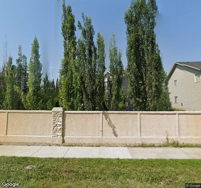 Street view of 22 Cougarstone Bay SW, Calgary
