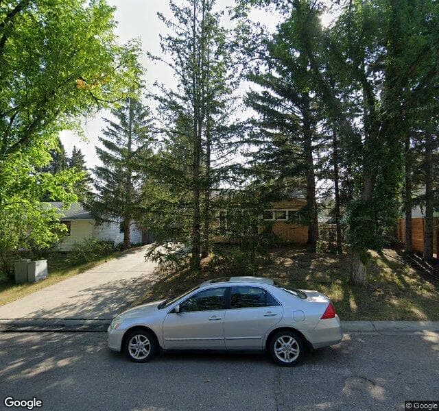 Street view of 104 Oakdale Place SW, Calgary