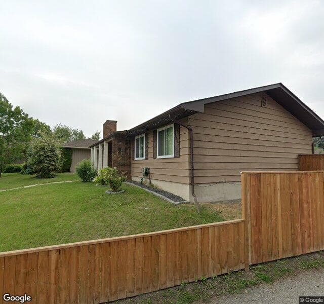 Street view of 148 Lake Lucerne Crescent SE, Calgary