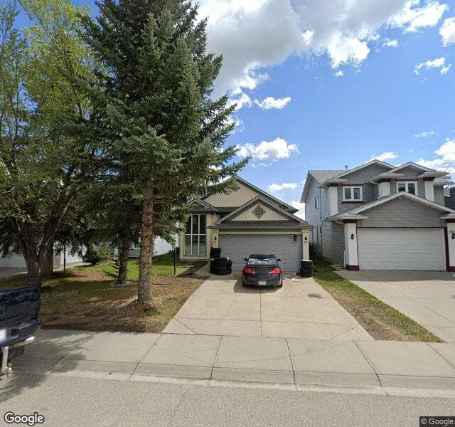 Street view of 16118 Shawbrooke Road SW, Calgary