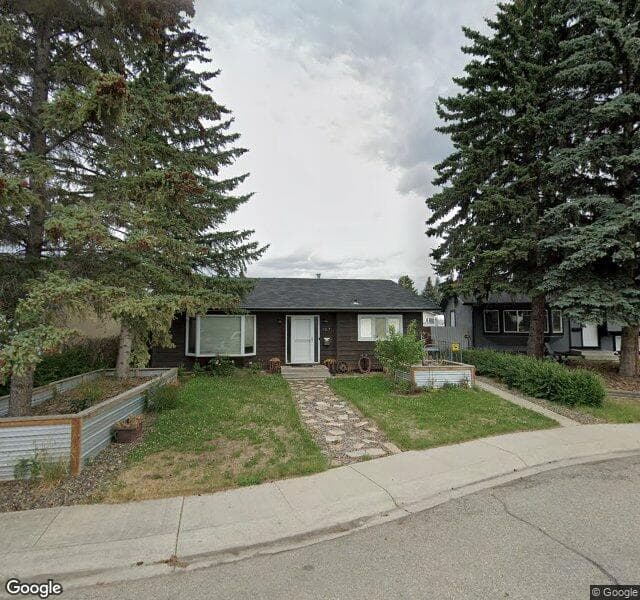 Street view of 107 Lake Sylvan Close SE, Calgary