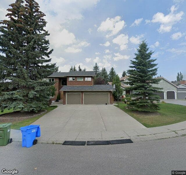 Street view of 15 Woodacres Way SW, Calgary