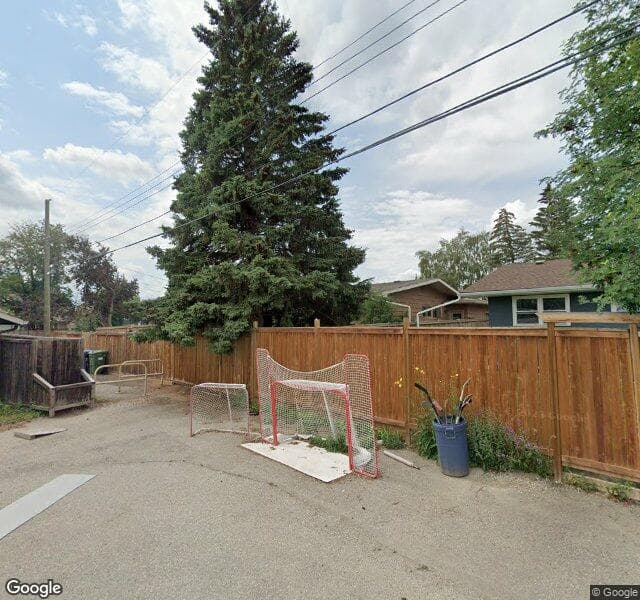 Street view of 1211 Lake Sundance Crescent SE, Calgary