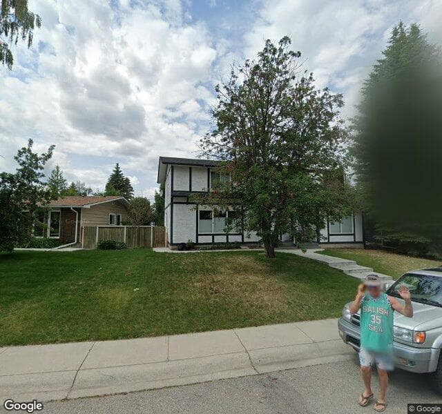 Street view of 1439 Lake Twintree Way SE, Calgary