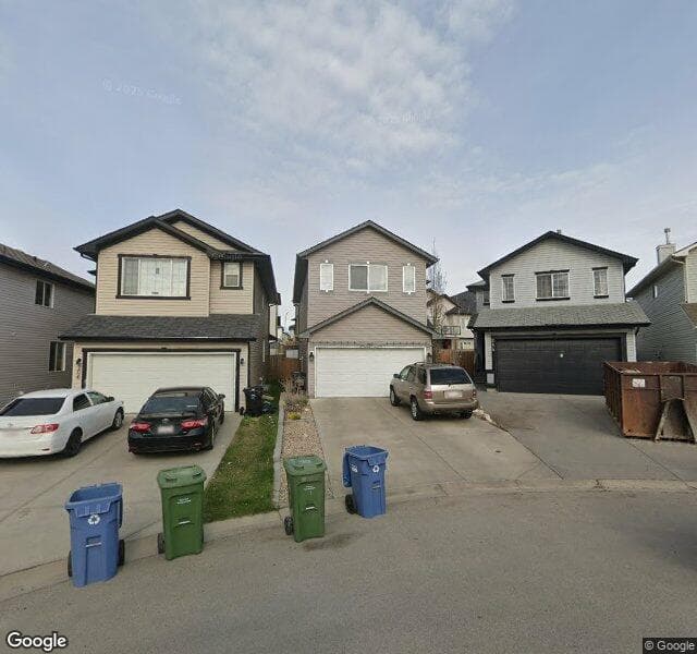 Street view of 210 Covemeadow Bay NE, Calgary