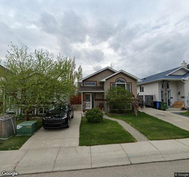Street view of 1078 Bridlemeadows Manor SW, Calgary