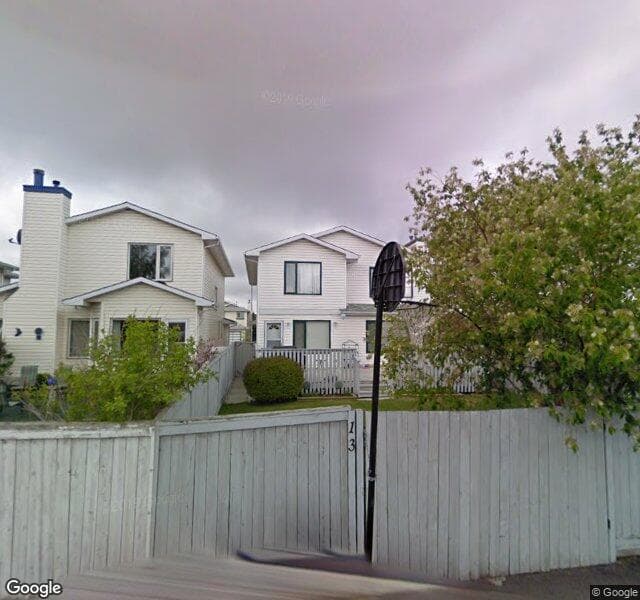 Street view of 13 Riverwood Circle SE, Calgary