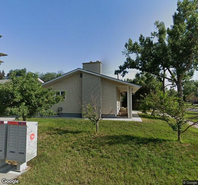 Street view of 1055 Acadia Drive SE, Calgary