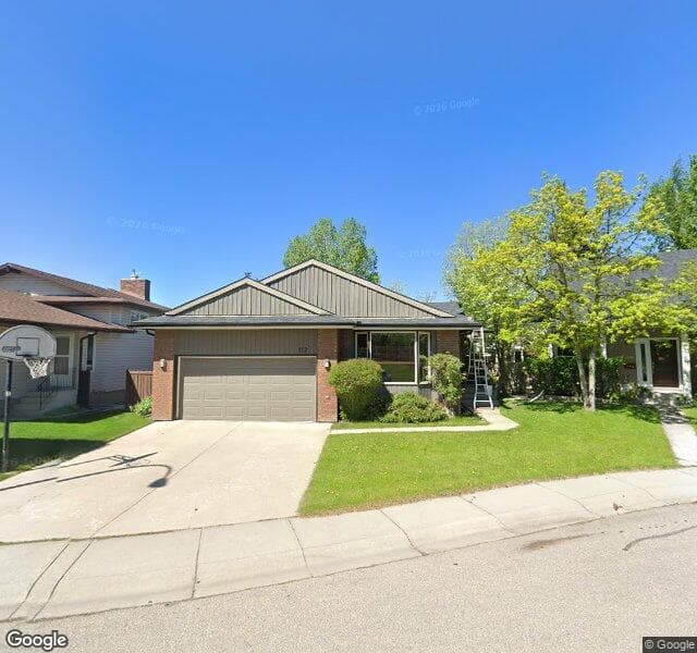 Street view of 112 Woodbrook Close SW, Calgary