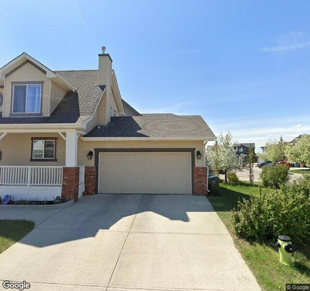 Street view of 198 Cougarstone Close SW, Calgary