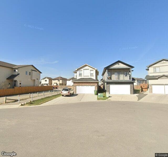Street view of 101 Covecreek Bay NE, Calgary