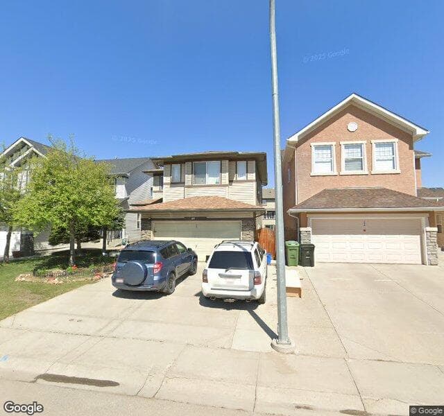 Street view of 102 Panamount Lane NW, Calgary