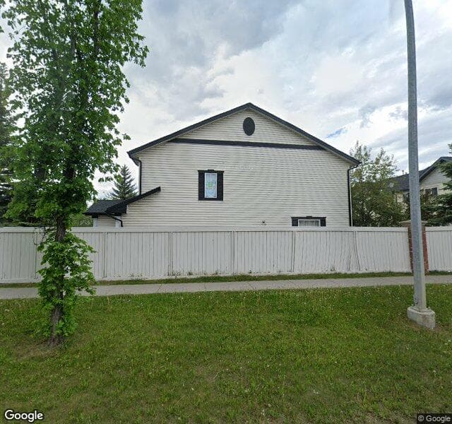 Street view of 328 Country Village Cape NE, Calgary