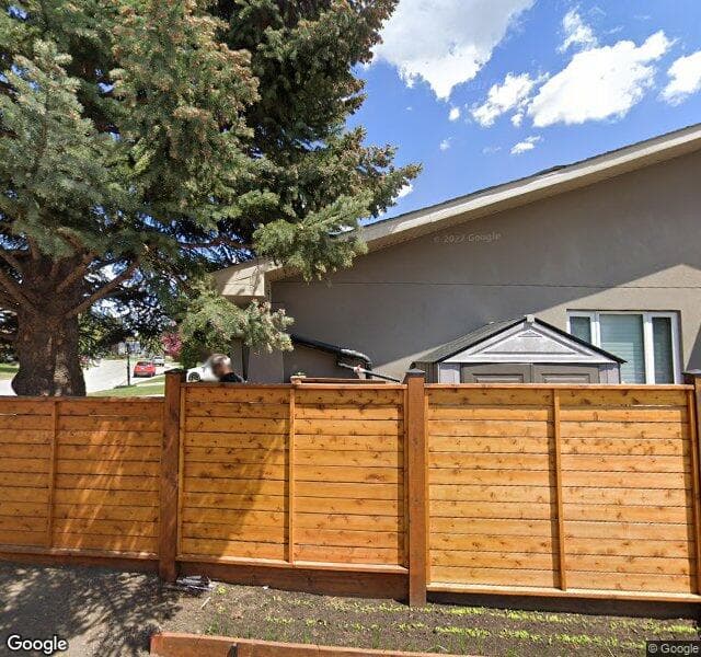 Street view of 12368 Lake Moraine Rise SE, Calgary