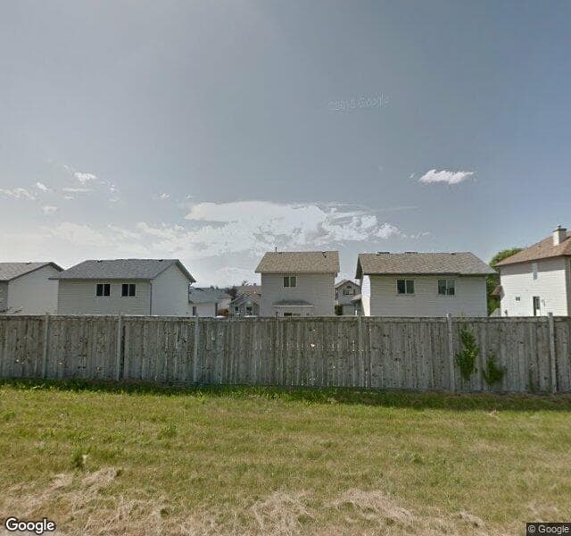 Street view of 38 Rivercrest Way SE, Calgary