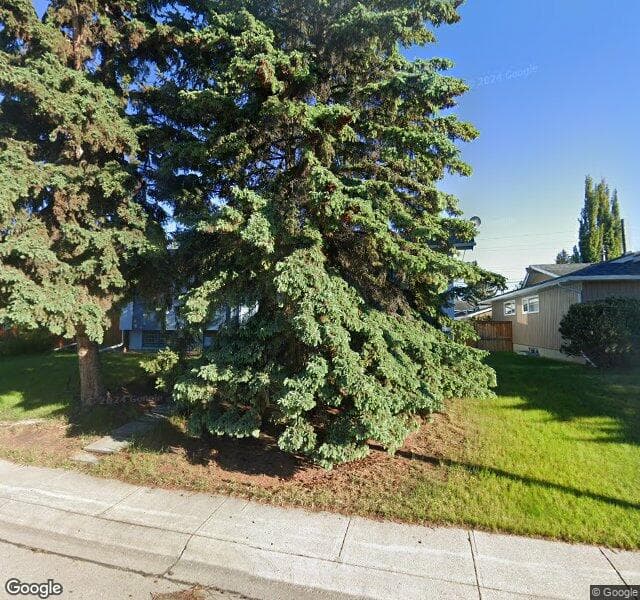 Street view of 1523 Lake Bonavista Drive SE, Calgary