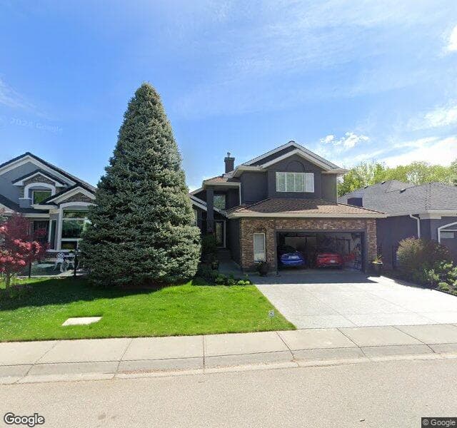 Street view of 115 Mckenzie Lake View SE, Calgary