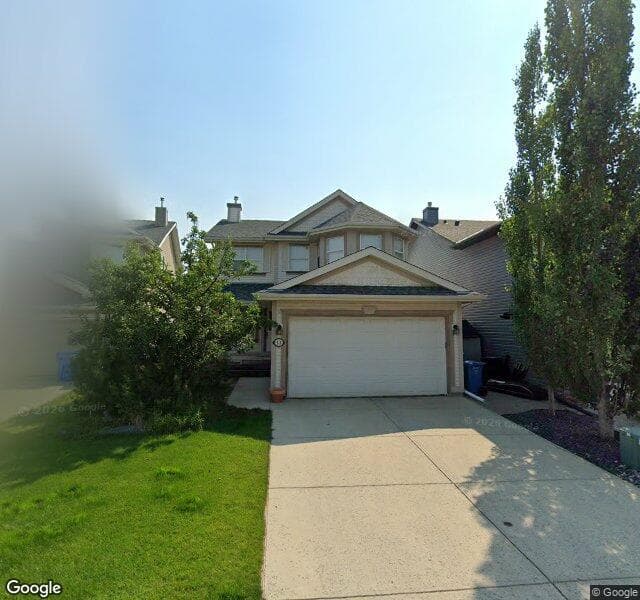 Street view of 14 Cougarstone Mews SW, Calgary
