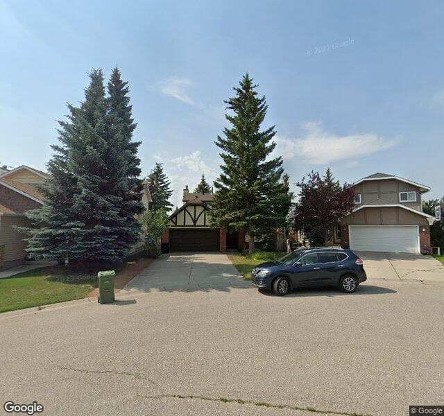 Street view of 128 Wood Valley Rise SW, Calgary