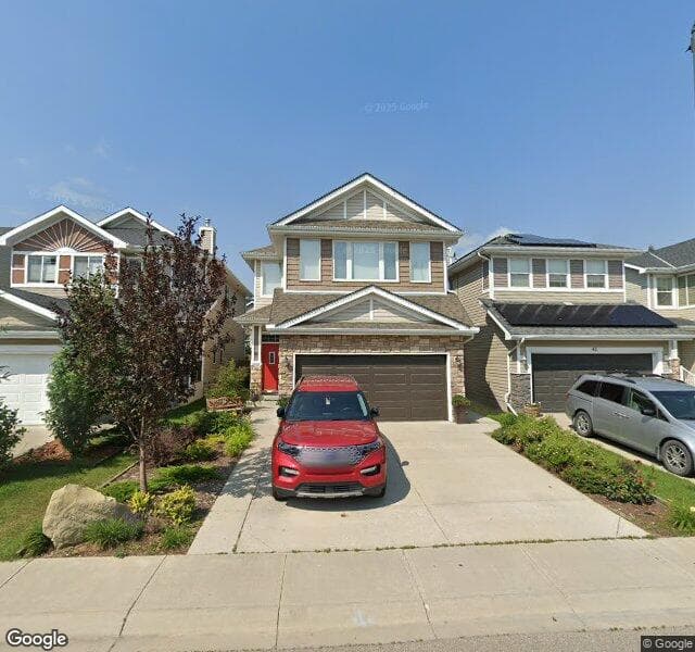 Street view of 47 Cougar Plateau Way SW, Calgary