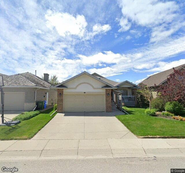 Street view of 144 Douglas Shore Close SE, Calgary