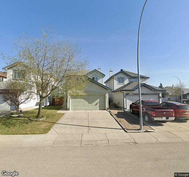 Street view of 122 Coville Square NE, Calgary