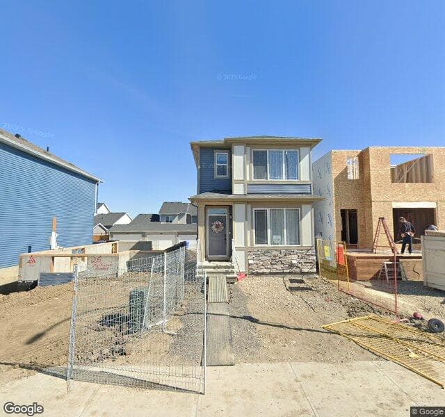Street view of 30 Creekside Manor SW, Calgary