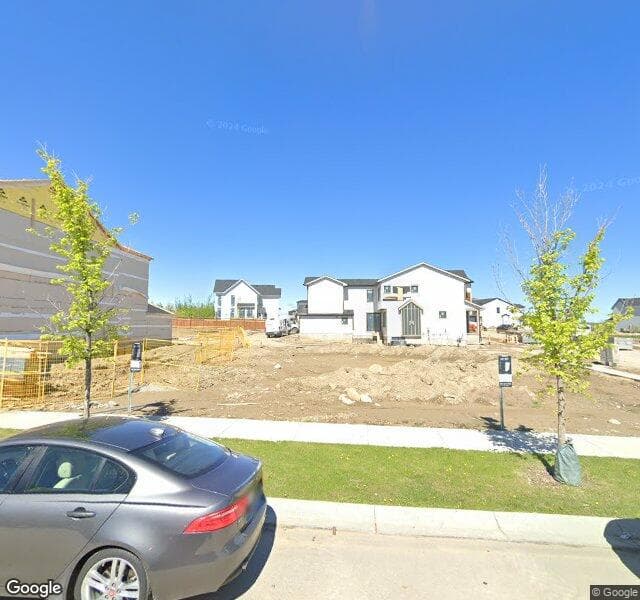 Street view of 211 Treeline View SW, Calgary